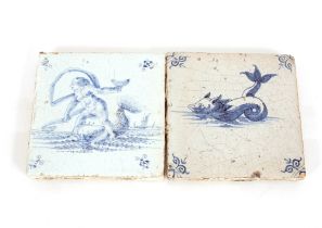 An 18th Century blue and white tile, decorated with erotic scenes of Neptune and mermaid; and