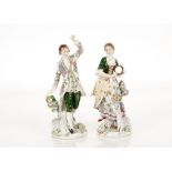 A pair of Dresden style figures, of dancers, 21cm high