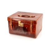 A small vintage leather trunk, with plush lined interior, 45cm x 36cm