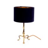 A brass Pullman type table lamp, with blue shade, 46cm high