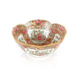 A late 19th / early 20th Century Cantonese porcelain bowl, of lotus form profusely decorated and