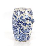 A Chinese style blue and white barrel shaped garden seat, with bird and floral decoration, 51cm high
