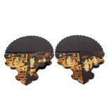 A pair of early 20th Century lacquered chinoiserie folding wall brackets