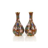 A pair of 19th Century Chinese cloisonné vases,. decorated butterflies and flowers, 16cm high