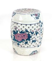 A Chinese style porcelain barrel shaped garden seat, with all over floral decoration AF, 48cm high