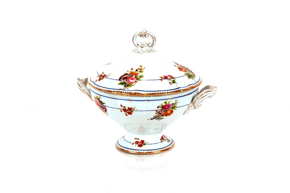 A Victorian soup tureen, painted floral sprays and heightened in gilt, 29cm high