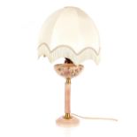 A pink porcelain oil lamp style table lamp, with silk tasselled shade, 77cm high