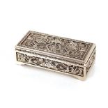 A good quality Chinese white metal oblong jewellery box, the whole profusely decorated in relief