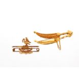 A 9ct gold bar brooch, inscribed "Sans Changer" 2.