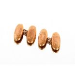 A pair of 9ct gold cuff-links