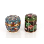 A 19th Century cloisonné box and cover, of cylindrical form decorated with cranes and flowers on a