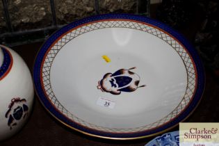 A large porcelain shallow dish with foliate and gi