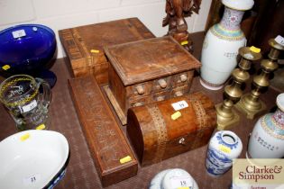 A Victorian walnut dome top trinket box; a carved