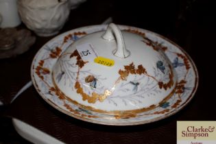 A 19th Century porcelain dish and cover with butte