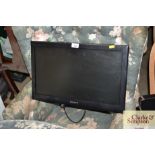 A Sony Bravia flat screen television with remote c