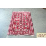 An approximate 4'1" x 2'10" Eastern red patterned