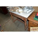 A stripped pine and marble topped wash stand