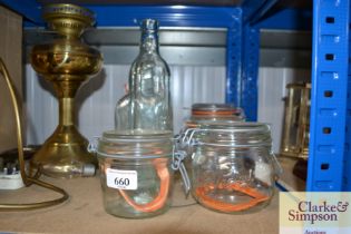 A quantity of glass storage jars