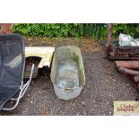 A galvanised bath converted to a planter