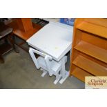 A grey painted school desk and chair