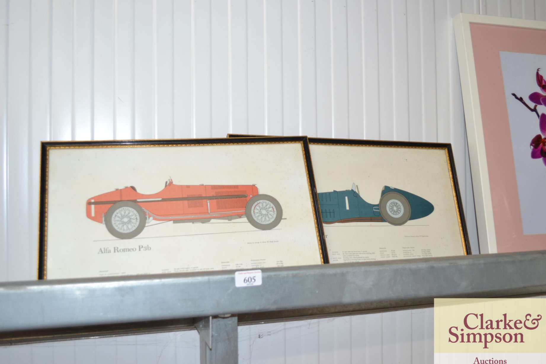 Two framed and glazed prints of an Alfa Romeo and