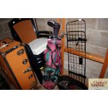 A golf bag and clubs