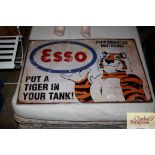 A reproduction Esso sign