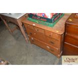 An oak multi drawer chest