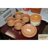 A quantity of Ashdale pottery storage jars and mug