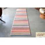 An approximate 5'9" x 3'9" Gooch Oriental stripe p