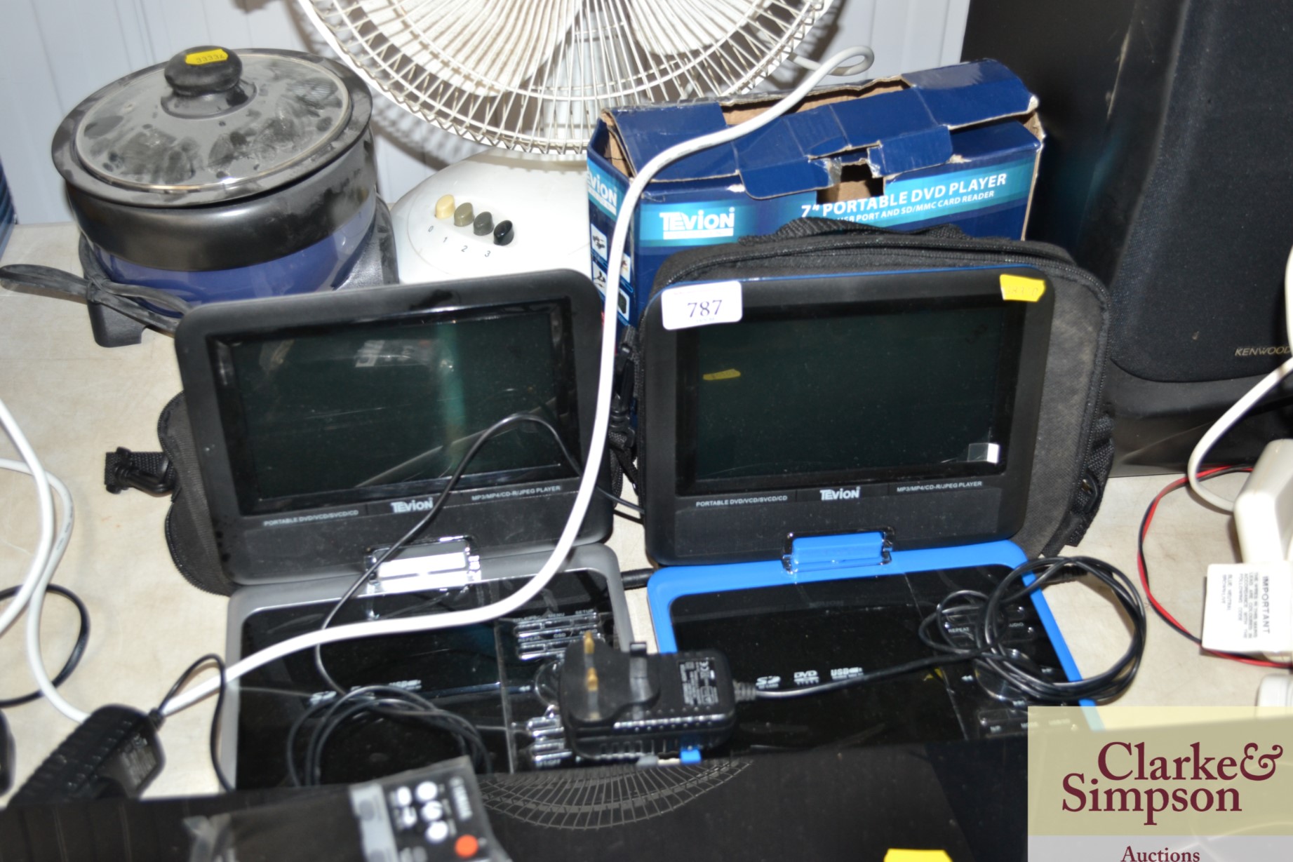 Two portable DVD players with carry bags