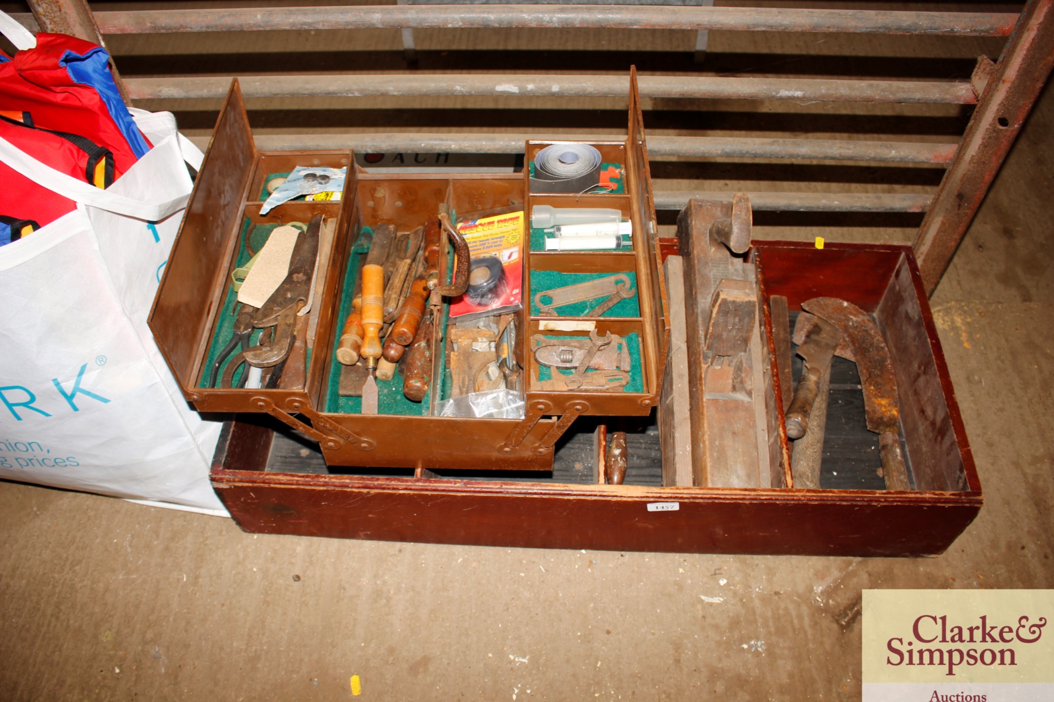 A wooden box and cantilever tool box with contents