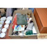 A box containing various sundry items to include s