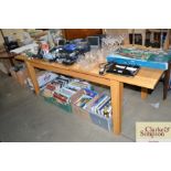 A light oak extending dining table