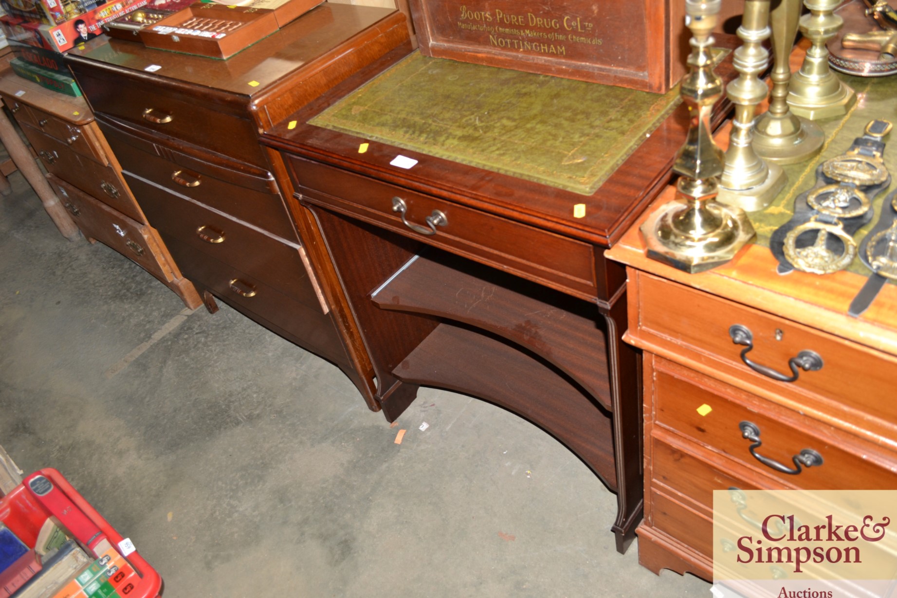 A mahogany writing table fitted single drawer with