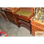 A mahogany writing table fitted single drawer with