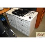 A pair of modern three drawer bedside chests