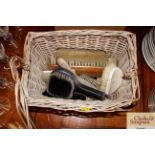 A wicker basket and contents of various vintage br