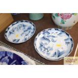 A pair of Chinese underglaze blue and white saucer