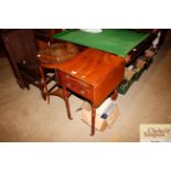 A 19th Century mahogany drop leaf sewing table