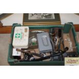 A box of miscellaneous items to include old camera