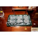 A boxed set of cut glass napkin holders