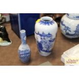 A Chinese blue and white baluster vase; and a smal