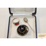 A Victorian diamond set circular mourning brooch;