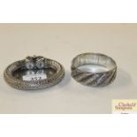 A heavy white metal Moroccan bangle; an Eastern wh