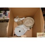 A box containing a quantity of enamel bed pans etc