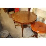 An Edwardian inlaid mahogany centre table