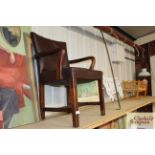 A mahogany framed Trepaco Furnishings elbow chair