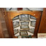 A stripped pine corner cupboard