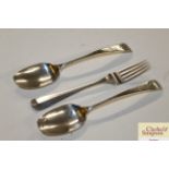 A pair of 18th Century Colonial white metal serving spoons; and a fork